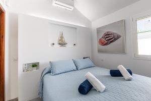 Postel nebo postele na pokoji v ubytování Playa Flor 77 by VillaGranCanaria + 40 fotografií