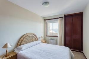 Postel nebo postele na pokoji v ubytování Apartamentos Granxola