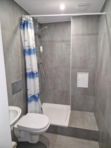 Koupelna v ubytování Hotel Wikinger Hof