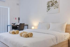 Ένα ή περισσότερα κρεβάτια σε δωμάτιο στο New Studio in Msida