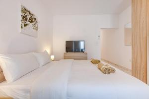 Ένα ή περισσότερα κρεβάτια σε δωμάτιο στο New Studio in Msida