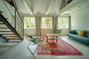 Istumisnurk majutusasutuses Sibyllenhof, Denkmalgeschütztes Reetdachanwesen in ruhiger Alleinlage