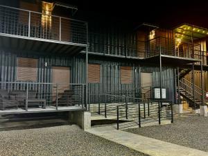 a building with stairs and a bench in front of it at Hacienda del Sur in Santa Isabel