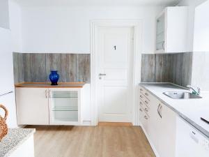 Kuchyň nebo kuchyňský kout v ubytování Viborg Guesthouse - Billig Overnatning Viborg