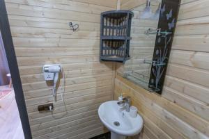 Baðherbergi á Inga Jafaridze Guesthouse Pele