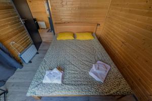 Postel nebo postele na pokoji v ubytování Inga Jafaridze Guesthouse Pele