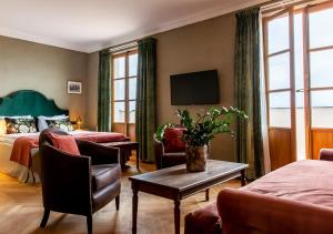 TV a/nebo společenská místnost v ubytování Langley Resort Napoléon Bonaparte