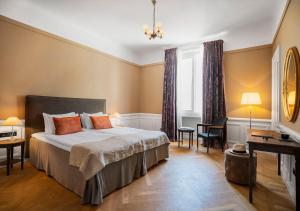 Postel nebo postele na pokoji v ubytování Langley Resort Napoléon Bonaparte