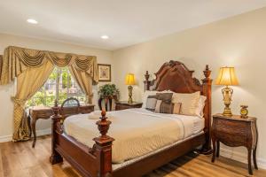 a bedroom with a large bed and a window at @ Marbella Lane - Hidden Gem in Orange County in Orange +73 photos
