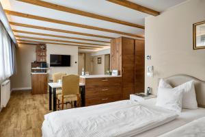 Postel nebo postele na pokoji v ubytování Hotel Kraft