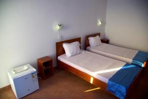 Letto o letti in una camera di Cacimba Sunset Lodge