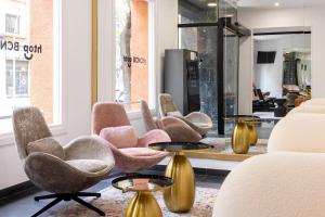 a row of chairs and tables in a store at htop BCN - City in Barcelona +17 photos