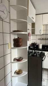 Η κουζίνα ή μικρή κουζίνα στο Apartamento Jacarandá Bessa