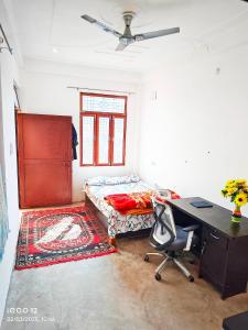Postel nebo postele na pokoji v ubytování Rai Homestay