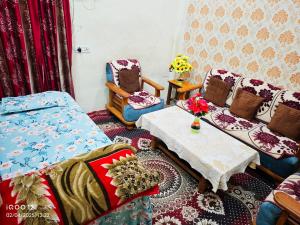 Postel nebo postele na pokoji v ubytování Rai Homestay