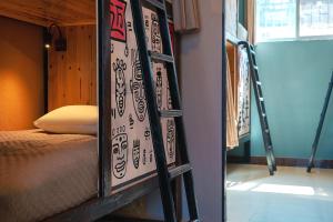 Da Bing's House Youth Park Dali Store客房内的一张或多张床位