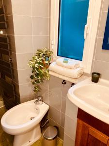 Koupelna v ubytování Porta a Piastri Apartment + 9 fotografií