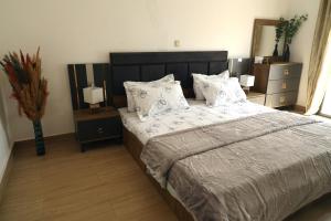 Postel nebo postele na pokoji v ubytování Duplex au bord du fleuve