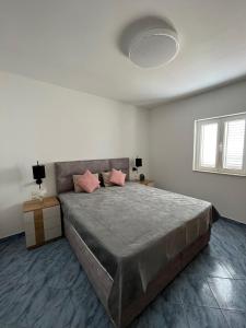 Postel nebo postele na pokoji v ubytování Beach Apartments