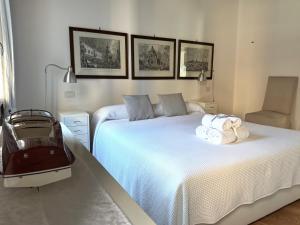A bed or beds in a room at Capitan Antonin
