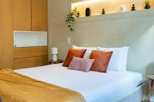 Postel nebo postele na pokoji v ubytování The Charm of Bolhão - Nairobi