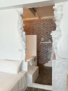 Letto o letti in una camera di White&Light B&B