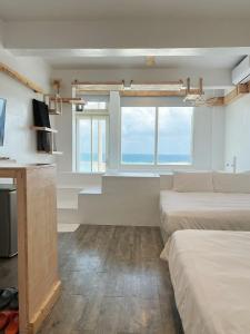 Letto o letti in una camera di White&Light B&B