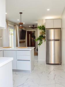 Una cocina o kitchenette en Eva Spa Resort Rooftop Pool 1br