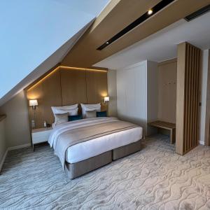 Posteľ alebo postele v izbe v ubytovaní Normafa Hotel & Retreat