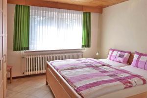 Postel nebo postele na pokoji v ubytování Blütenpracht