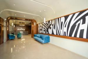 Posezení v ubytování Sunday Hotel Vadodara