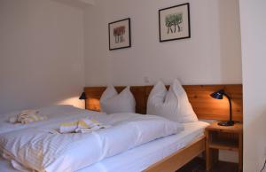 Postel nebo postele na pokoji v ubytování Resi K02