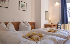 Postel nebo postele na pokoji v ubytování Resi K02