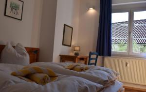 Postel nebo postele na pokoji v ubytování Resi K02