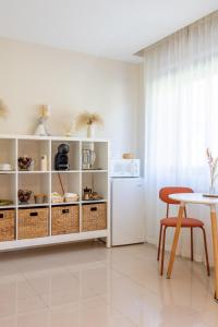 Una cocina o zona de cocina en Hostal Lóbrega