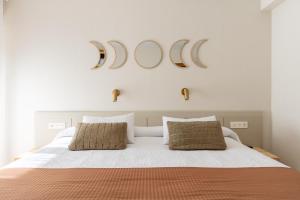 Cama o camas de una habitación en Hostal Lóbrega