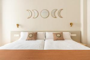 Cama o camas de una habitación en Hostal Lóbrega