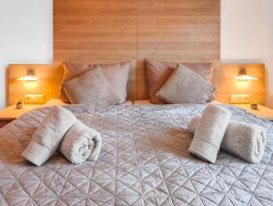 En eller flere senge i et værelse på Zentrale Luxus Apartments Nürnberg, Balkon, Parkplatz, Self-Check-in