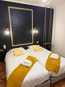 Posteľ alebo postele v izbe v ubytovaní Piscine chauffée-Beauval et Châteaux-