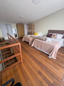 Postel nebo postele na pokoji v ubytování Govinda House