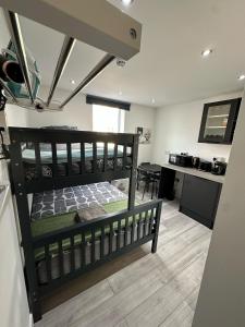 Kuchyň nebo kuchyňský kout v ubytování Fulham Guest Studios 268