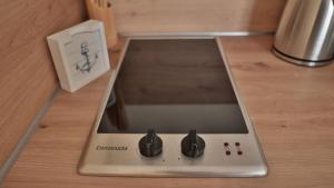 a scale sitting on top of a wooden table at Wohnung "Wolgast" in Gützkow