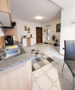 Kuchyň nebo kuchyňský kout v ubytování Ferienwohnung Meyer