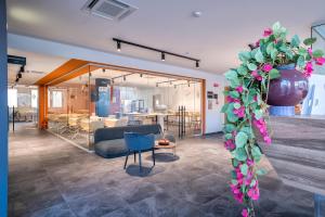Posezení v ubytování B&B HOTEL Sassari