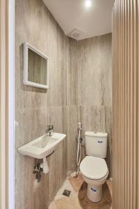 Фотография из галереи Amwaj Apt - Wake to Waves Stylish 1-Bedroom by the Shore в городе Мирлефт