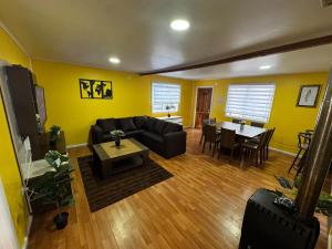 a living room with a couch and a table at Casa Grande en Osorno central en parcela 2 para 6 p in Osorno