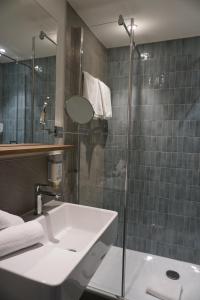 Koupelna v ubytování Dom-Hotel