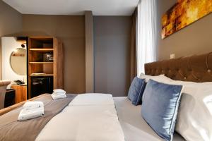 Ένα ή περισσότερα κρεβάτια σε δωμάτιο στο Vayalen Boutique Hotel +62 φωτογραφίες