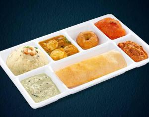 a white tray filled with different types of food at Janz Marina Bay in Puducherry