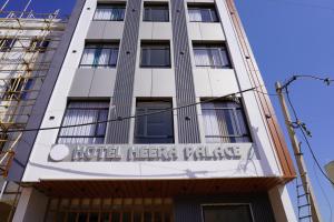 a building with a hotel lettuce palace sign on it at Hotel Heera Palace in Khātu